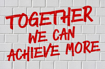 Wall Mural - Graffiti on a brick wall - Together we can achieve more