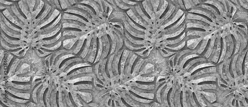 Nowoczesny obraz na płótnie Tropical leaves monstera of concrete on a concrete background. High quality seamless realistic texture. Bas-relief