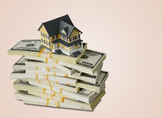 Wall Mural - Stack of money with house on background
