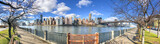 Fototapeta Miasta - Panoramic view of Midtown Manhattan and East River from Roosevelt Island on a sunny day, New York City