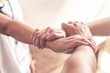 © rachaphak - People hand assemble as a connection meeting teamwork concept. Group of people assembly hands as business or work achievement. Man and women touch each other hands after meeting. Teamwork conceptual.