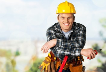 Poster - Male worker with tool belt isolated on