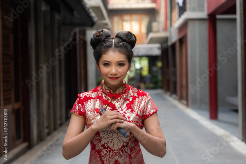 Portrait Images Of Chinese Girl Wearing A Red Cheongsam Dress Made