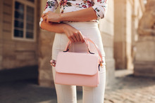 Close-up Of Stylish Female Handbag. Young Woman Wearing Beautiful Outfit And Accessories Outdoors. City Fashion