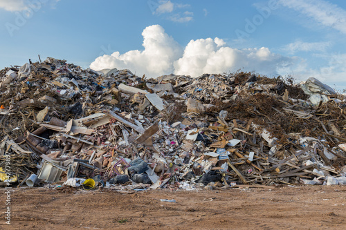 Fotografía Three-story-high storm debris piles following devastating hurricane season