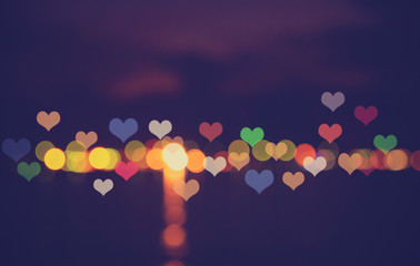 Wall Mural - Hearts bokeh on water reflex,love or romance concept for Valentine's day