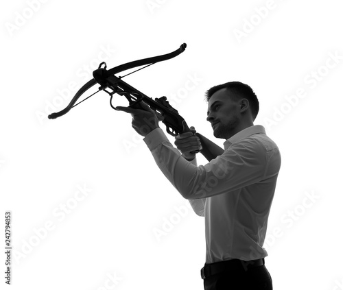 Portrait of young businessman with crossbow on white background Tableau sur Toile