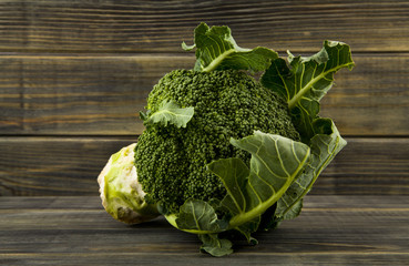 Sticker - Raw green broccoli on wooden background