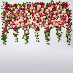 Wall Mural - wedding decoration - composition of colorful roses and peonies flowers over white wall