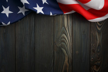 American Flag On Dark Wooden Board
