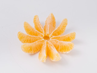 citrus fruit mandarin orange on white background with zest.