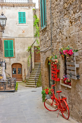 Fototapete - Beautiful alley in Tuscany, Old town, Pitigliano, Italy