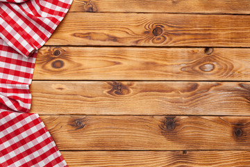 checkered tablecloth on wooden table