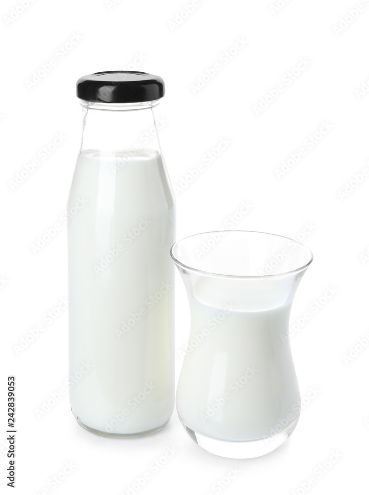 Bottle and glass of fresh milk on white background