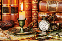 Pocket Watch, Burning Candle And Old Books