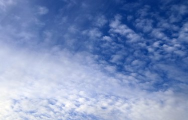 Beautiful shot of alto cumulus clouds in a blue sky