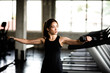 © ic36006 - Fitness woman in training exercises with dumbbells.