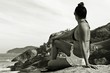 © Pedro de Paula - Beautiful girl watching the sea on the rock at Santinho Beach, on the Island of Florianopolis, Brazil.