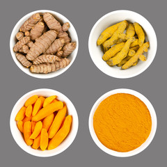 Wall Mural - Turmeric in white bowls. Fresh rhizomes, whole and peeled, processed and powder. Curcuma longa, tumeric. Spice for curries, coloring mustard and in medicine. Food photo closeup from above over gray.