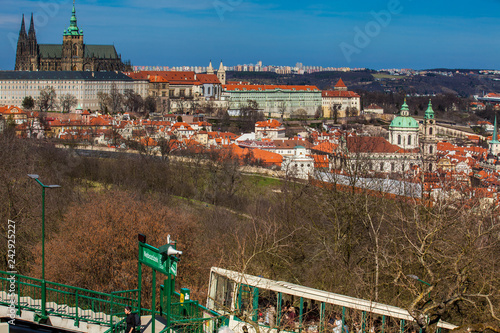 Photo PRAGUE, CZECH REPUBLIC - APRIL, 2018: Tourists on the Petrin funicular with the