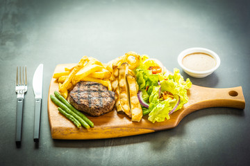 Sticker - Grilled beef meat steak with french fries sauce and fresh vegetable