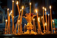 Many Burning Wax Candles In The Orthodox Church Or Temple