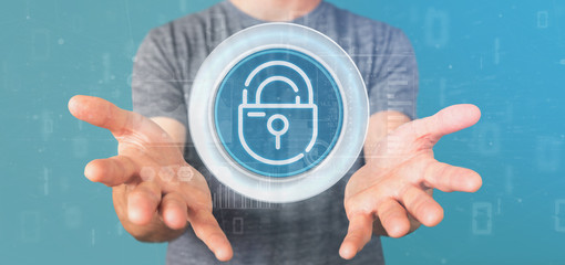 businessman holding security padlock wheel icon with stats and binary code 3d rendering