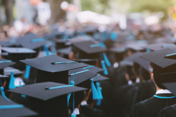 backside graduation hats during commencement success graduates of the university, concept education 