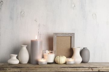 Wall Mural - Neutral colored vases and candles as home decor