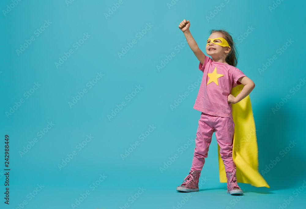 child playing superhero - obrazy, fototapety, plakaty 