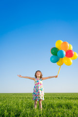 Sticker - Happy child playing outdoors in spring field