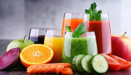 Glasses with fresh organic vegetable and fruit juices