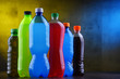 Plastic bottles of assorted carbonated soft drinks