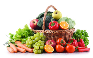 Fresh organic fruits and vegetables in wicker basket