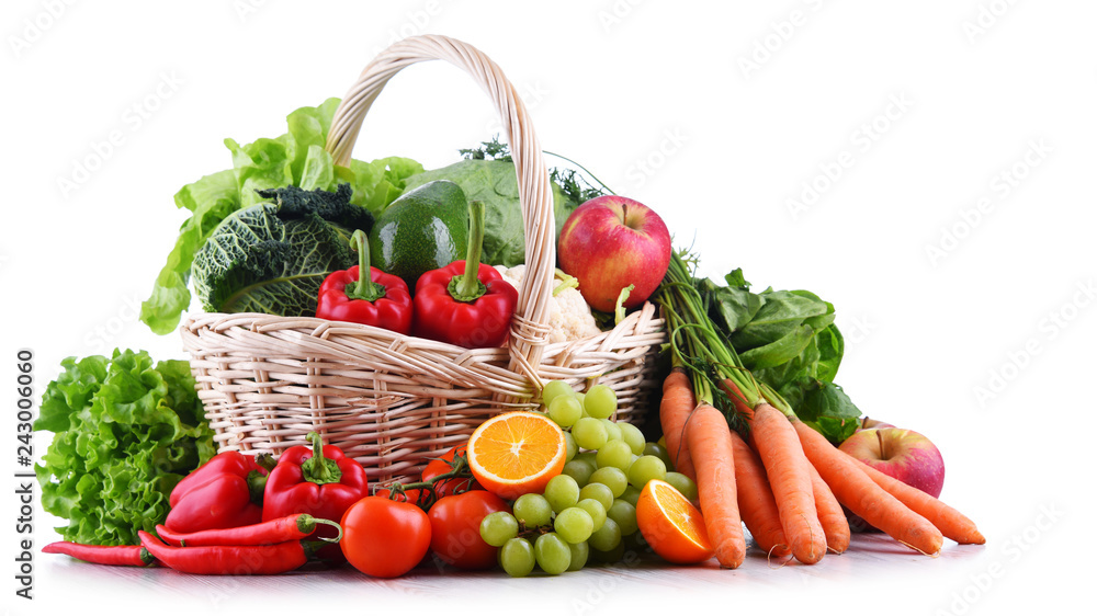Fresh organic fruits and vegetables in wicker basket - obrazy, fototapety, plakaty 