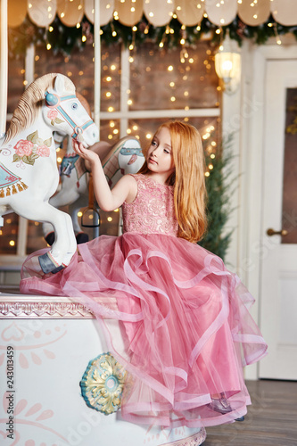 Beautiful Red Haired Girl With Long Hair And Blue Eyes Rides A
