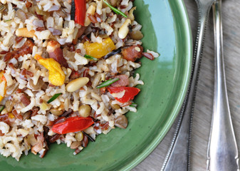 Wall Mural - Wholegrain rice with beans and peppers on a plate