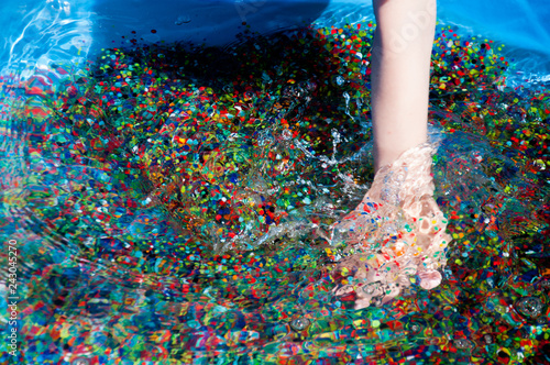 Fotografía multicolored water beads in child's hands