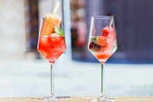Transparent Glasses Of Wine, Popsicles, Watermelon, Strawberry, Blackberry And Mint
