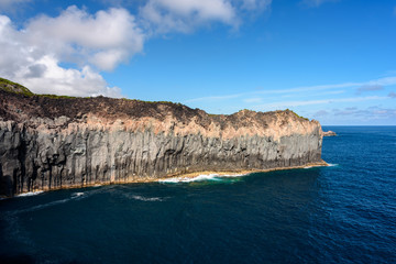 Wall Mural - seascape with cliff  in terceria, view of the volcano's cliff in terceira. seascape in azores, portugal.