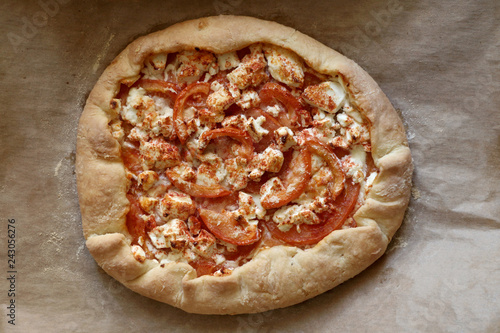 Fotografie, Obraz Tomato and feta cheese, seasoned with smoked pepper