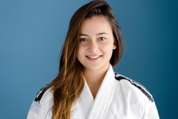 Portrait of a young woman in BJJ Judo Karate Gi