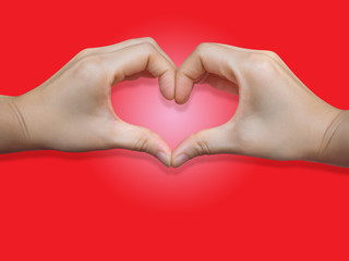 Heart shape of two hand put on red background