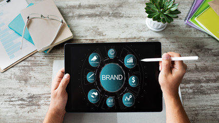 Wall Mural - brand management. awareness increase, marketing and advertising concept.