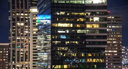 Wall Mural - Night view of office building window close up