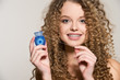 © darkfreya - Healthy, beautiful smile, cute teen  with dental braces smiling . Portrait of a girl with orthodontic appliance. Girl brushing her teeth with dental floss.