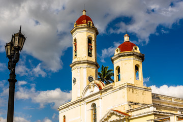 Wall Mural - Travel photo of Cienfuegos Jose Marti central park with palms, pavilion and historical buildings, Cienfuegos Province, Cuba.