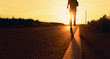 © sutadimages - Athlete runner feet running on road