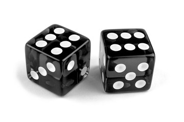 Wall Mural - Two black glass dice isolated on white background. Six and six.