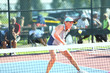 © Ron Alvey - A woman competes in a pickleball match